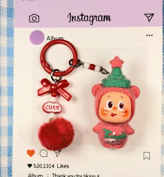PVC keyring sample with a large round ring and multiple decorative charms