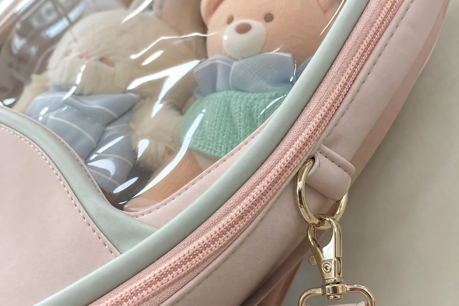 close-up of clear window zipper trim and stitching for a custom convertible ita bag