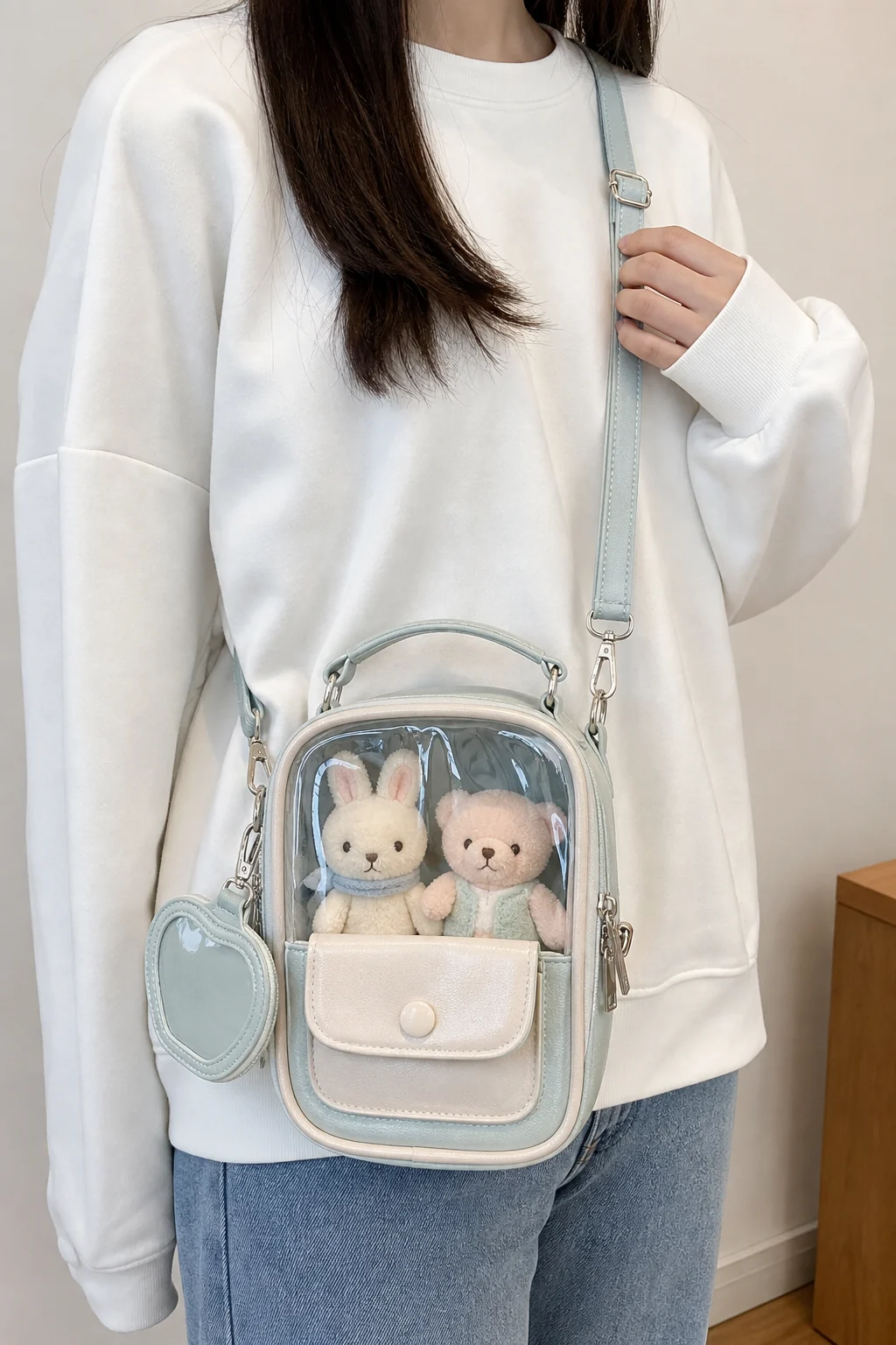 custom convertible ita bag worn crossbody with original plush doll display