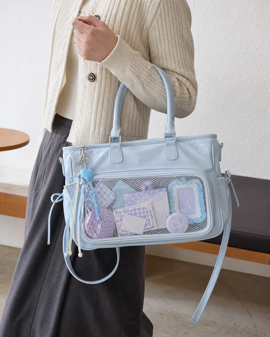 Custom ita bag hand-carry lifestyle photo hand-carry lifestyle photo of a custom horizontal ita bag with clear display window