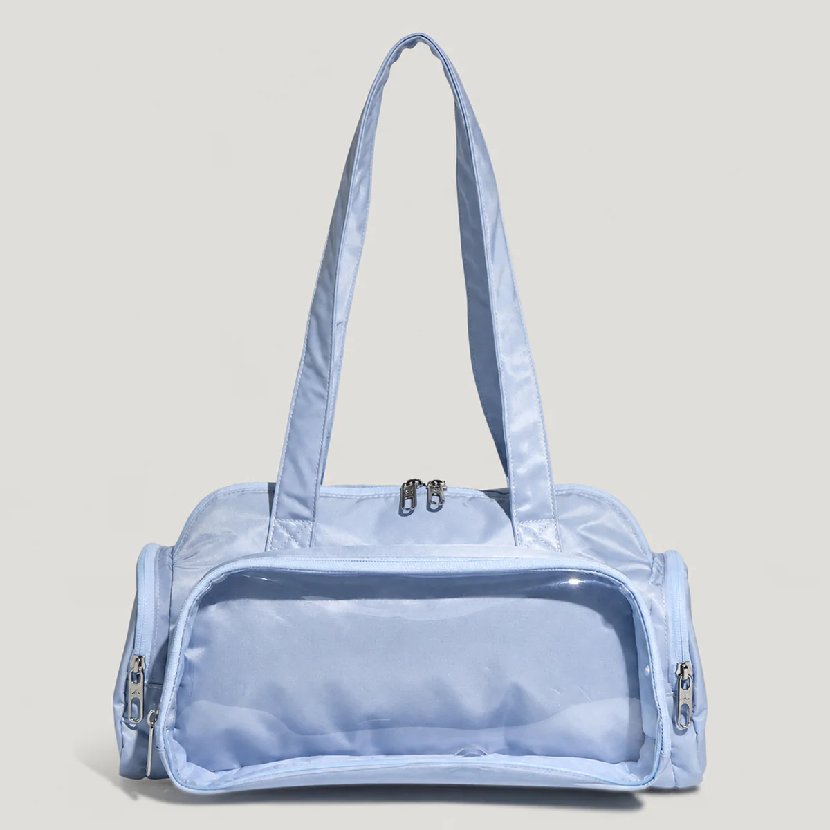 front view of an empty light blue large Boston ita bag with a wide clear display compartment