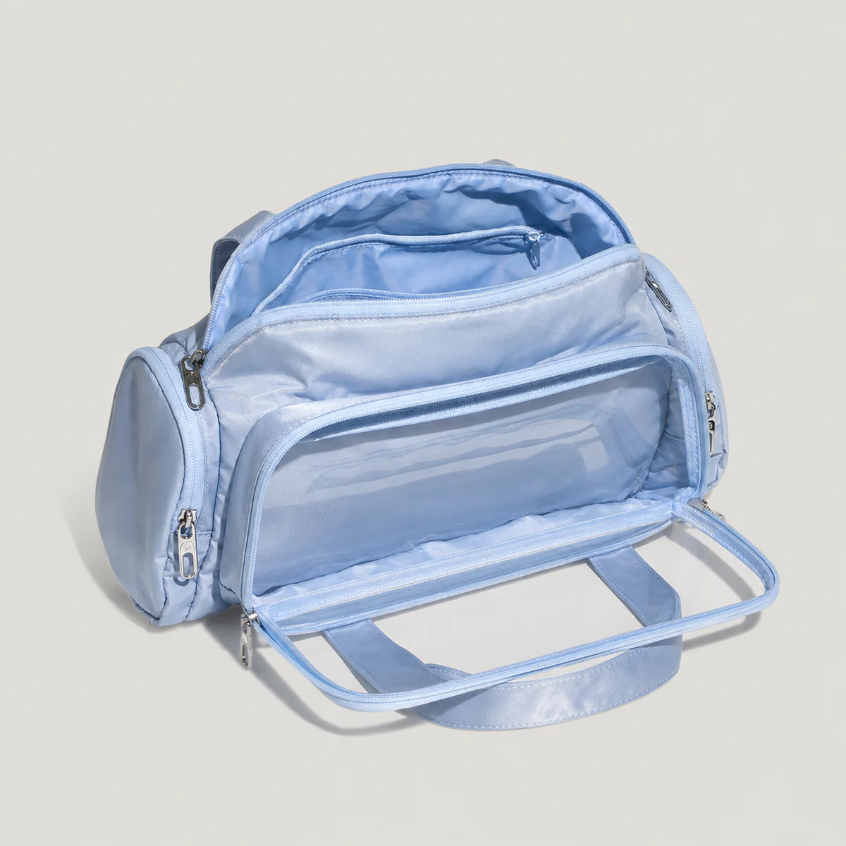 open large Boston ita bag showing separate clear display and main storage compartments