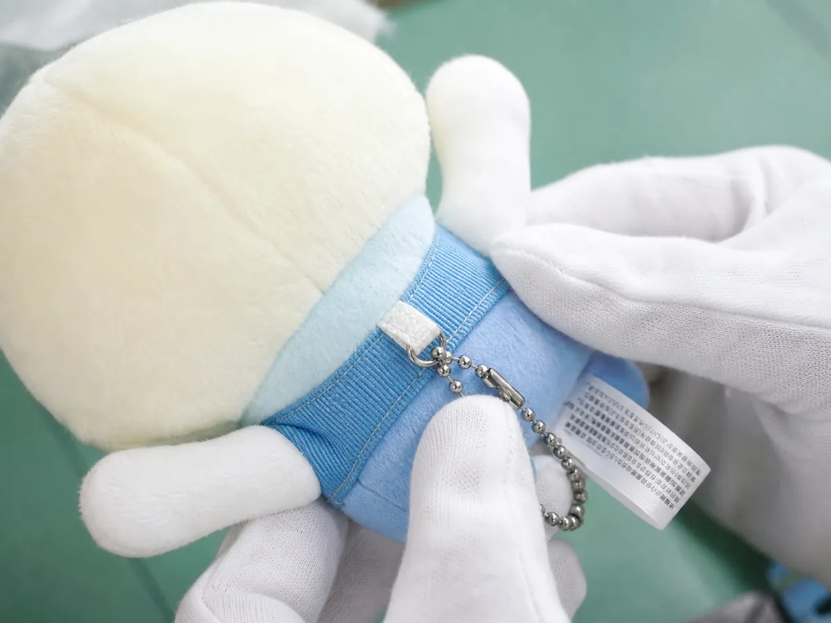 reinforced sewing at the plush ball chain attachment point