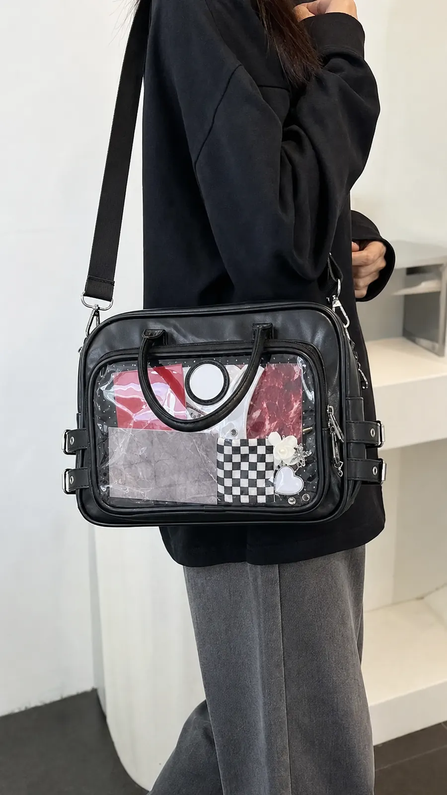 Black ita crossbody bag sample styled for daily carrying
