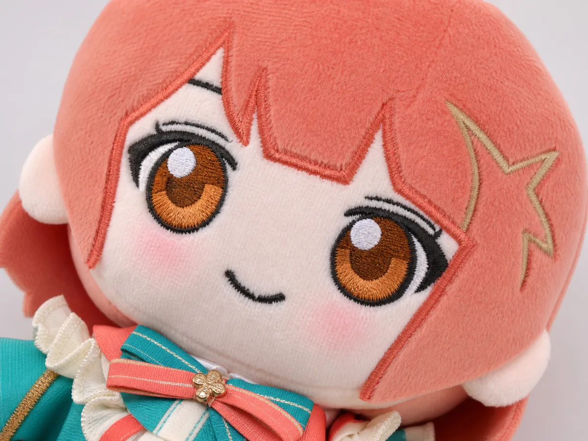 sample close-up for facial embroidery on an idol live merch plush