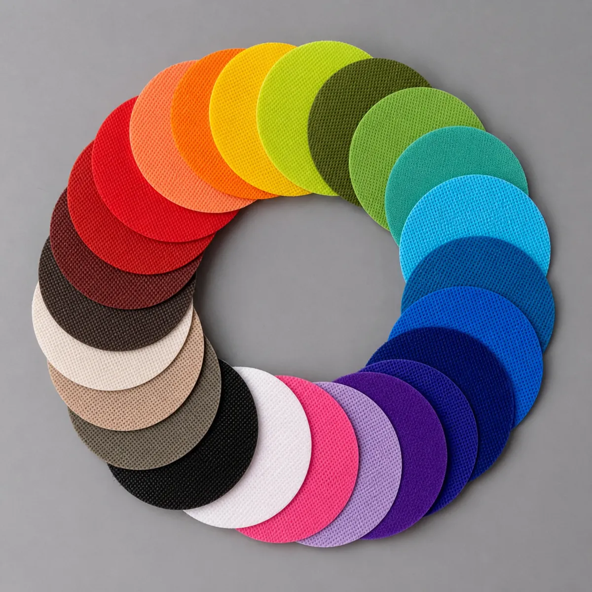 Round non-woven fabric color swatches showing many material color options