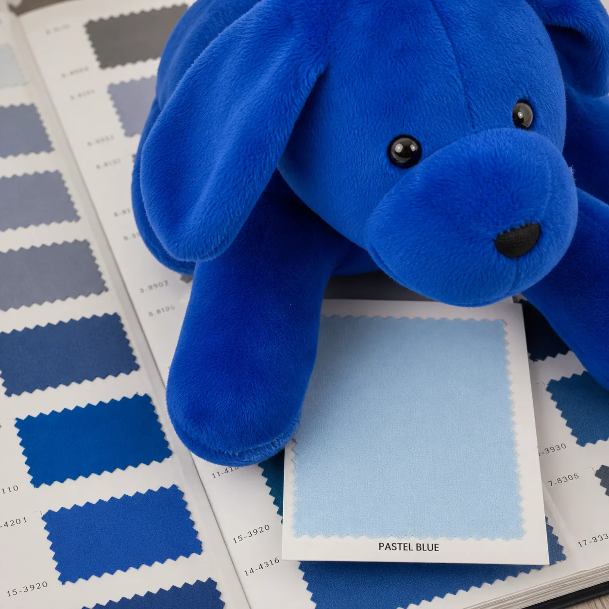 royal blue plush fabric beside a selected pastel blue color swatch showing a clear mismatch