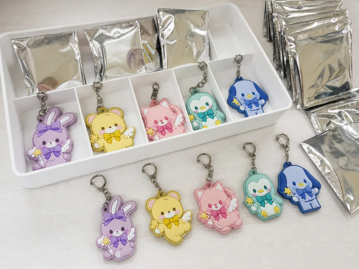 Five-color PVC rubber keyring series with blind-pack pouches