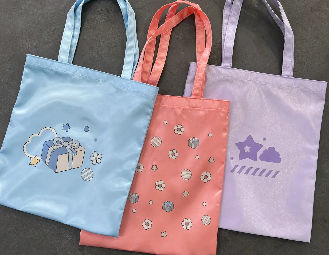 Satin and polyester tote bag samples with full-color transfer printing