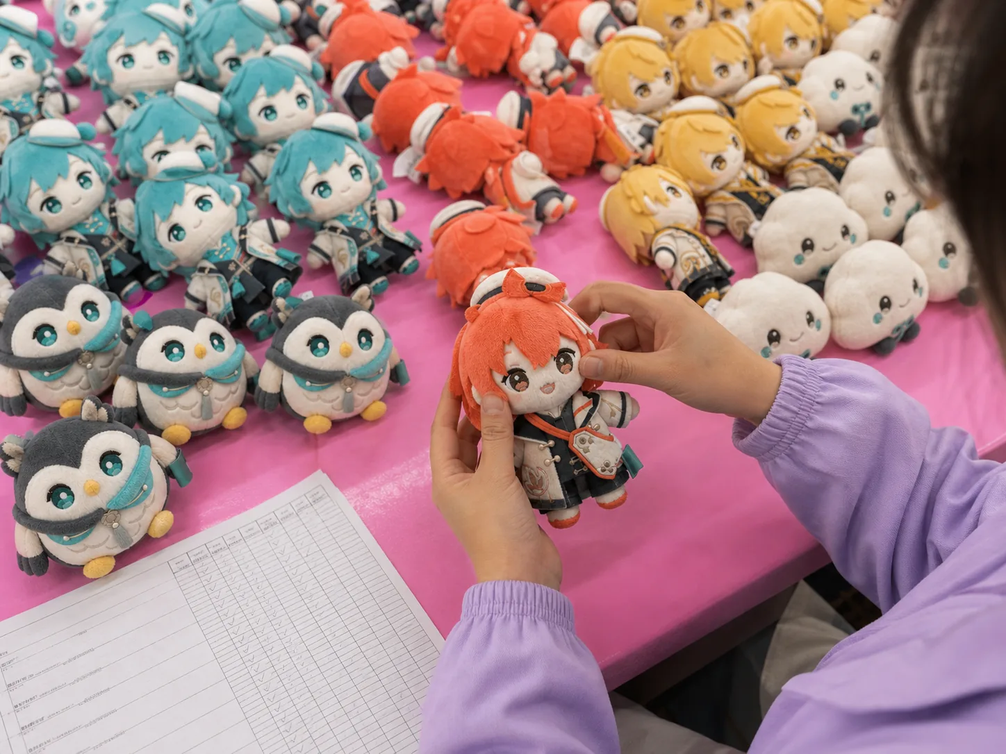 manual inspection of facial embroidery sewing and tags for mass-produced VTuber plush