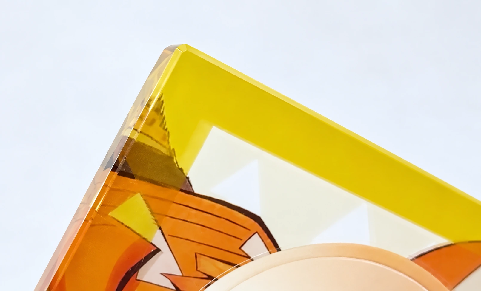 Close-up of a 45-degree beveled edge on thick custom acrylic